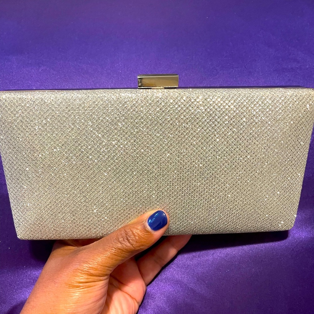 Women’s clutch purse with chain strap